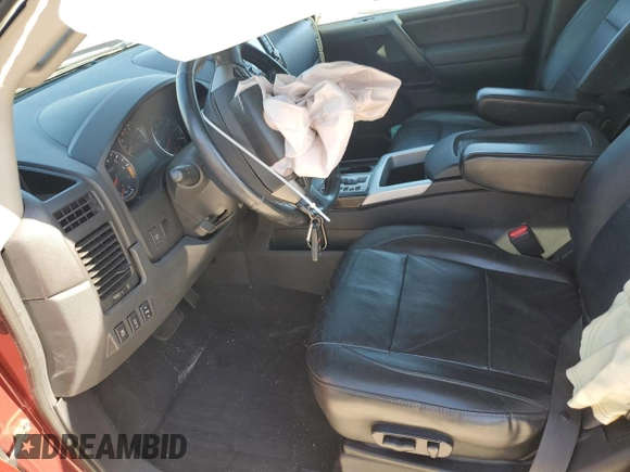 2013 Nissan Titan SL with VIN 1N6BA0ED7DN312114, listed as a Copart auction lot 77144014 with 120,656 mi miles and Salvage Title. Bid and sale history available at carsss.com. Image 7.