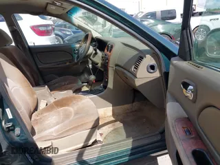 1999 Hyundai Sonata GLS with VIN KMHWF35V6XA107973, listed as a IAAI auction lot 42119318 with 174,231 mi miles. Bid and sale history available at carsss.com. Image 5.