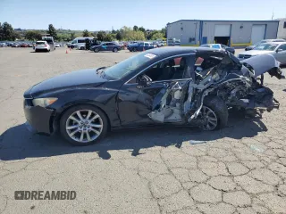 2014 Mazda 6 i Touring with VIN JM1GJ1V6XE1117231, listed as a Copart auction lot 52404935 with 214,103 mi miles and Salvage Title. Bid and sale history available at DreamBid. Image 1.
