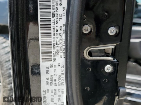 2014 Ram 1500 Lone Star z VIN 1C6RR6LG5ES114085, wystawiony jako Copart lot #66417334 z przebiegiem 168 847 mil mil oraz Szkoda całkowita • Salvage title. Historia ofert i sprzedaży dostępna na DreamBid. Obrazek 14.