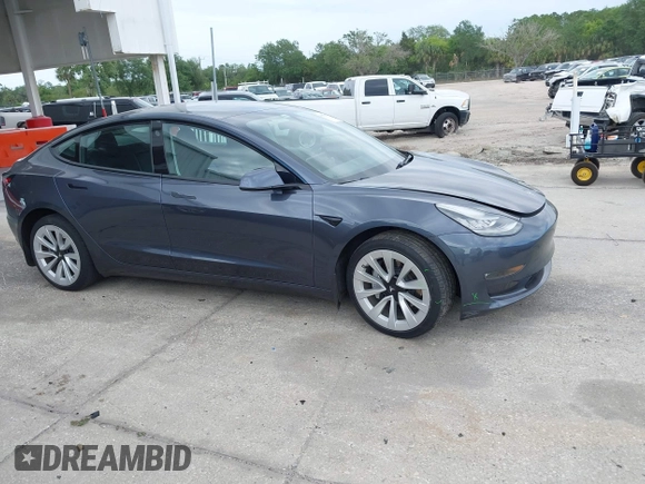 2021 Tesla Model 3 Long Range with VIN 5YJ3E1EB4MF855581, listed as a IAAI auction lot 41974515 with 71,561 mi miles. Bid and sale history available at carsss.com. Image 13.
