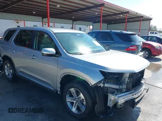 2023 Honda Pilot EX-L 8 Passenger with VIN 5FNYG2H42PB001292, listed as a IAAI auction lot 41594469 with 21,470 mi miles. Bid and sale history available at carsss.com. Image 1.