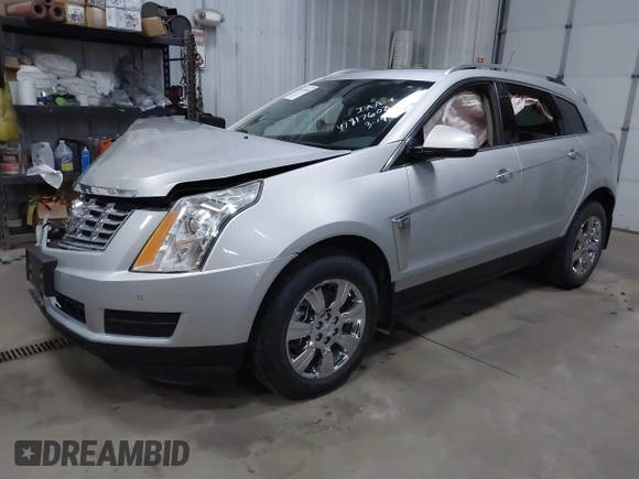 2014 Cadillac SRX Luxury Collection z VIN 3GYFNEE36ES679505, wystawiony jako IAAI lot #41817608 z przebiegiem 62 351 mil mil oraz . Historia ofert i sprzedaży dostępna na DreamBid. Obrazek 20.