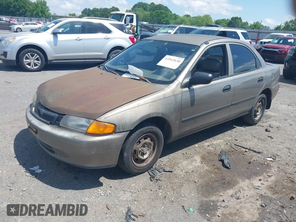 1997 Mazda Protege DX with VIN JM1BC1416V0132633, listed as a IAAI auction lot 42162630 with 234,300 mi miles and . Bid and sale history available at DreamBid. Image 2.