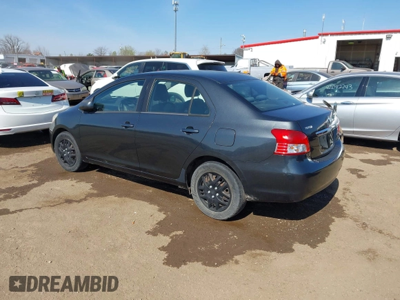 2009 Toyota Yaris with VIN JTDBT903194047784, listed as a IAAI auction lot 42049872 with 115,735 mi miles. Bid and sale history available at carsss.com. Image 3.