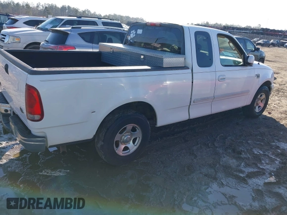 2003 Ford F-150 XL with VIN 1FTRX17W93NB66494, listed as a IAAI auction lot 41451666 with 205,770 mi miles. Bid and sale history available at carsss.com. Image 4.