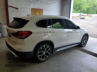 2020 BMW X1 xDrive28i z VIN WBXJG9C00L5P42487, wystawiony jako Copart lot #59669325 z przebiegiem 88 402 mil mil oraz Szkoda całkowita • Salvage title. Historia ofert i sprzedaży dostępna na DreamBid. Obrazek 3.