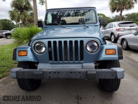 1998 Jeep Wrangler Sport with VIN 1J4FY19S9WP782841, listed as a Copart auction lot 75063524 with 0 mi miles and Non Repairable. Bid and sale history available at carsss.com. Image 5.