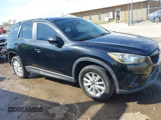 2014 Mazda CX-5 Sport with VIN JM3KE4BE6E0388909, listed as a IAAI auction lot 41876514 with 196,882 mi miles. Bid and sale history available at carsss.com. Image 14.