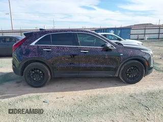 2020 Cadillac XT4 FWD Luxury z VIN 1GYAZAR48LF151119, wystawiony jako IAAI lot #41327430 z przebiegiem 62 704 mil mil oraz . Historia ofert i sprzedaży dostępna na DreamBid. Obrazek 13.