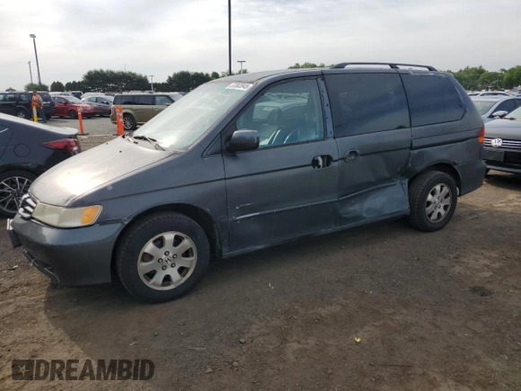 2004 Honda Odyssey EX-RES z VIN 5FNRL188X4B115002, wystawiony jako Copart lot #57883945 z przebiegiem Nie podano mil oraz Szkoda całkowita • Salvage title. Historia ofert i sprzedaży dostępna na DreamBid. Obrazek 1.