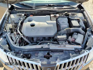 2012 Lincoln MKZ Hybrid z VIN 3LNDL2L33CR812788, wystawiony jako Copart lot #61068125 z przebiegiem 246 016 mil mil oraz Szkoda całkowita • Salvage title. Historia ofert i sprzedaży dostępna na DreamBid. Obrazek 11.