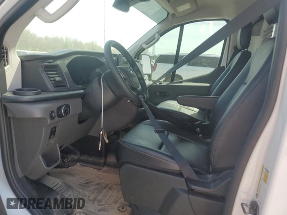 2024 Ford Transit Cargo with VIN 1FTYE1Y83RKA09653, listed as a Copart auction lot 50869985 with 5,549 mi miles and Salvage Title. Bid and sale history available at DreamBid. Image 7.