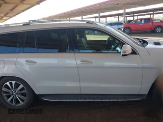2014 Mercedes-Benz GL 450 with VIN 4JGDF7CE3EA336481, listed as a IAAI auction lot 42025576 with 145,244 mi miles and . Bid and sale history available at DreamBid. Image 13.