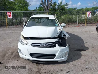 2014 Hyundai Accent GLS with VIN KMHCU4AE8EU608539, listed as a IAAI auction lot 41946784 with 106,709 mi miles and . Bid and sale history available at carsss.com. Image 11.