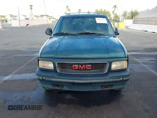 1997 GMC Jimmy SLS with VIN 1GKDT13W7V2516192, listed as a IAAI auction lot 41442979 with 154,518 mi miles. Bid and sale history available at carsss.com. Image 6.