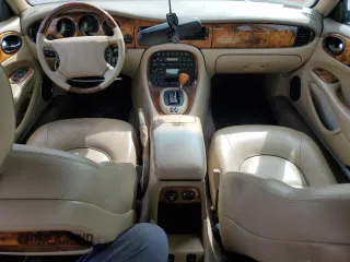 2002 Jaguar XJ 8 with VIN SAJDA14C62LF40435, listed as a Copart auction lot 52022645 with 153,703 mi miles and Salvage title. Bid and sale history available at DreamBid. Image 8.