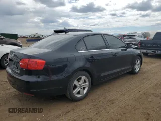 2014 Volkswagen Jetta TDI w/Premium with VIN 3VW3L7AJ9EM438697, listed as a Copart auction lot 57641645 with 191,231 mi miles and Salvage title. Bid and sale history available at DreamBid. Image 3.