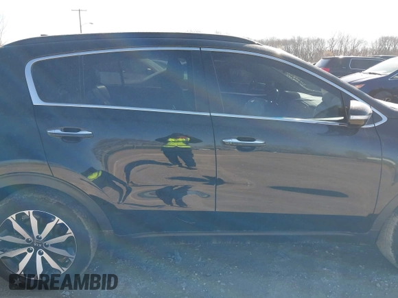 2018 Kia Sportage EX with VIN KNDPNCAC9J7324292, listed as a IAAI auction lot 41859338 with 124,519 mi miles and . Bid and sale history available at carsss.com. Image 13.