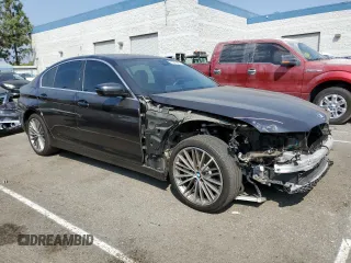 2020 BMW 5 Series 530i with VIN WBAJR3C04LWW81818, listed as a Copart auction lot 71645784 with 68,730 mi miles and Salvage Title. Bid and sale history available at DreamBid. Image 4.
