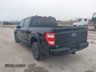 2023 Ford F-150 XL with VIN 1FTEW1C55PKD01184, listed as a IAAI auction lot 41700658 with 18,804 mi miles. Bid and sale history available at carsss.com. Image 3.