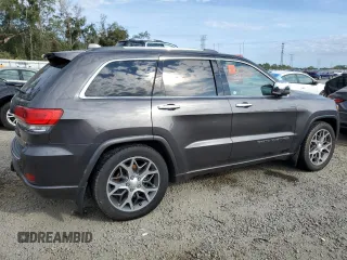 2021 Jeep Grand Cherokee Overland with VIN 1C4RJFCG9MC620320, listed as a Copart auction lot 85609814 with 61,335 mi miles and Salvage title. Bid and sale history available at DreamBid. Image 3.