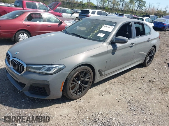 2021 BMW 5 Series 540i xDrive with VIN WBA73BJ03MWX30307, listed as a IAAI auction lot 41891615 with 27,374 mi miles and . Bid and sale history available at DreamBid. Image 2.