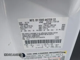 2014 Ford F-150 XL with VIN 1FTFW1EF1EFC93570, listed as a IAAI auction lot 41652787 with 265,015 mi miles. Bid and sale history available at carsss.com. Image 9.