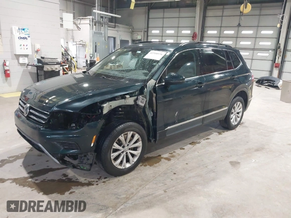 2018 Volkswagen Tiguan SEL with VIN 3VV2B7AX8JM113976, listed as a IAAI auction lot 42310576 with 100,319 mi miles and . Bid and sale history available at DreamBid. Image 17.