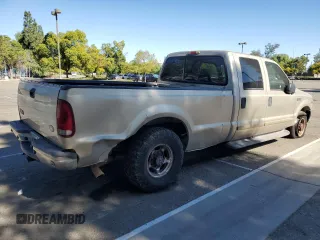 2001 Ford F-350 with VIN 3FTSW30S81MA31568, listed as a Copart auction lot 80055324 with 534,311 mi miles and Clean title. Bid and sale history available at DreamBid. Image 3.