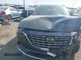 2021 Mazda CX-9 Signature with VIN JM3TCBEY5M0523199, listed as a IAAI auction lot 41916480 with 56,772 mi miles. Bid and sale history available at carsss.com. Image 12.