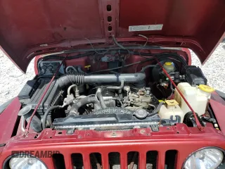 1999 Jeep Wrangler Sport with VIN 1J4FY19S8XP436667, listed as a Copart auction lot 59304544 with 167,747 mi miles and Clean Title. Bid and sale history available at carsss.com. Image 11.