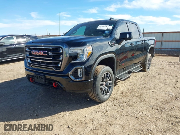 2021 GMC Sierra 1500 AT4 with VIN 1GTU9EETXMZ230606, listed as a IAAI auction lot 41599778 with 128,745 mi miles. Bid and sale history available at carsss.com. Image 6.