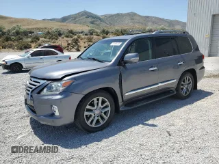 2015 Lexus LX 570 with VIN JTJHY7AX4F4170120, listed as a Copart auction lot 61599765 with 96,314 mi miles and Salvage title. Bid and sale history available at DreamBid. Image 1.