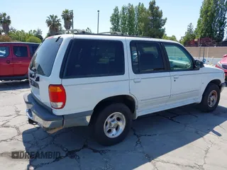 1998 Ford Explorer XLT z VIN 1FMZU32P6WZA04805, wystawiony jako IAAI lot #42569869 z przebiegiem 481 669 mil mil oraz . Historia ofert i sprzedaży dostępna na DreamBid. Obrazek 4.