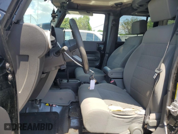2008 Jeep Wrangler Unlimited Sahara with VIN 1J4GA59178L501668, listed as a Copart auction lot 63586375 with 213,562 mi miles and Clean title. Bid and sale history available at DreamBid. Image 7.