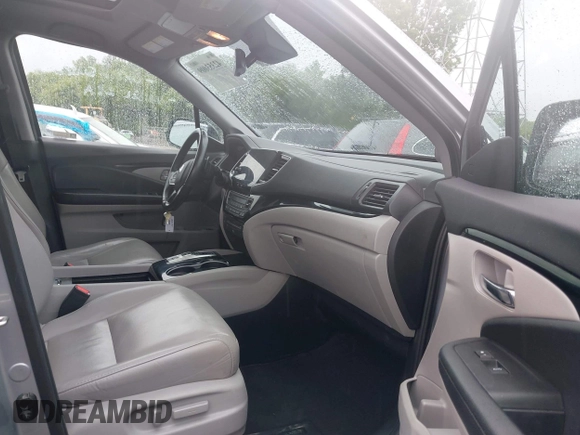 2019 Honda Pilot Touring 8-Passenger with VIN 5FNYF6H98KB097105, listed as a IAAI auction lot 42353009 with 133,212 mi miles and . Bid and sale history available at DreamBid. Image 5.