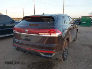 2024 Volkswagen Atlas SE with VIN 1V2JE2CA1RC235989, listed as a IAAI auction lot 41079770 with 9,723 mi miles and . Bid and sale history available at DreamBid. Image 4.
