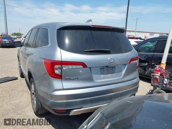 2020 Honda Pilot EX-L z VIN 5FNYF5H52LB007696, wystawiony jako IAAI lot #42065587 z przebiegiem 74 781 mil mil oraz . Historia ofert i sprzedaży dostępna na DreamBid. Obrazek 3.