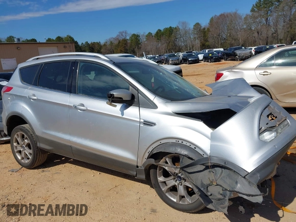 2015 Ford Escape Titanium with VIN 1FMCU0JX2FUB70760, listed as a IAAI auction lot 41649089 with 1 mi miles. Bid and sale history available at carsss.com. Image 14.