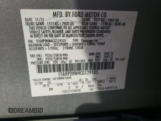2012 Ford Taurus SEL z VIN 1FAHP2HW4CG129105, wystawiony jako Copart lot #54708445 z przebiegiem 201 450 mil mil oraz Szkoda całkowita • Salvage title. Historia ofert i sprzedaży dostępna na DreamBid. Obrazek 12.