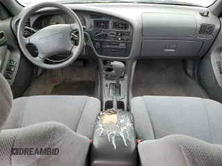 1995 Toyota Camry LE z VIN 4T1SK12E2SU617134, wystawiony jako Copart lot #54775365 z przebiegiem 305 046 mil mil oraz Szkoda całkowita • Salvage title. Historia ofert i sprzedaży dostępna na DreamBid. Obrazek 8.
