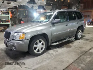 2009 GMC Envoy SLT with VIN 1GKDT43S092105737, listed as a Copart auction lot 84717594 with 148,512 mi miles and Salvage Title. Bid and sale history available at carsss.com. Image 1.