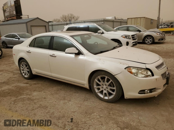 2012 Chevrolet Malibu LTZ with VIN 1G1ZG5E74CF315920, listed as a Copart auction lot 48864385 with 163,221 mi miles and Salvage Title. Bid and sale history available at DreamBid. Image 4.