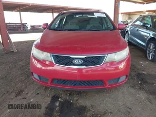 2013 Kia Forte EX with VIN KNAFU4A25D5682823, listed as a IAAI auction lot 41985904 with 173,856 mi miles. Bid and sale history available at carsss.com. Image 12.