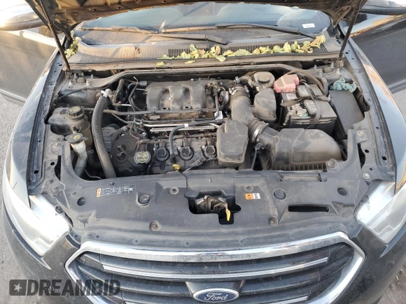 2015 Ford Taurus Limited with VIN 1FAHP2F88FG144487, listed as a Copart auction lot 42692205 with 147,597 mi miles and Salvage Title. Bid and sale history available at DreamBid. Image 12.