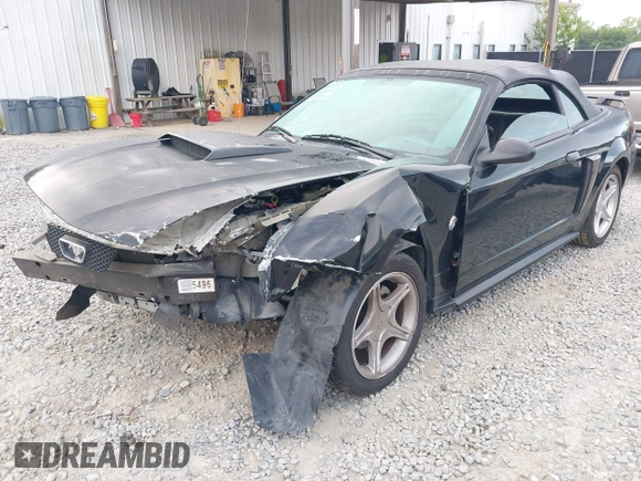 2004 Ford Mustang GT Deluxe z VIN 1FAFP45X64F104911, wystawiony jako IAAI lot #42025366 z przebiegiem 78 686 mil mil oraz . Historia ofert i sprzedaży dostępna na DreamBid. Obrazek 2.