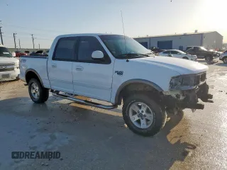 2002 Ford F-150 XLT with VIN 1FTRW08692KD89789, listed as a Copart auction lot 52621555 with 150,012 mi miles and Salvage Title. Bid and sale history available at carsss.com. Image 4.