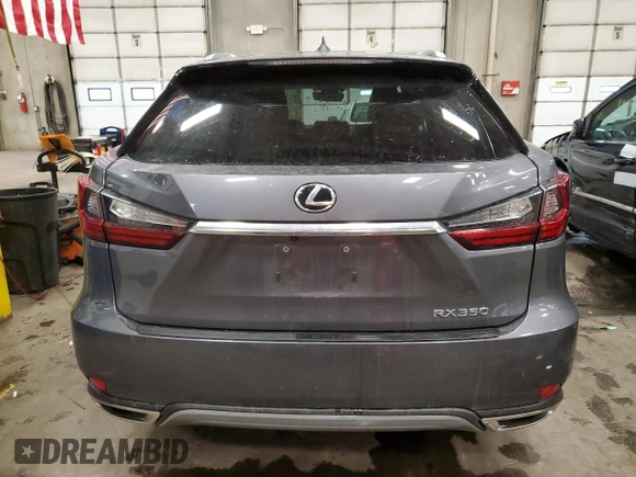 2022 Lexus RX with VIN 2T2HZMDA2NC323851, listed as a Copart auction lot 70025382 with 26,613 mi miles. Bid and sale history available at carsss.com. Image 6.
