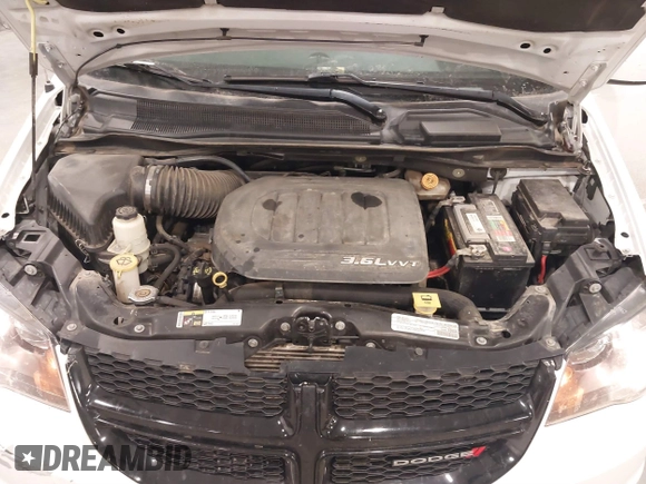 2019 Dodge Grand Caravan SE with VIN 2C4RDGBG8KR531227, listed as a IAAI auction lot 41594753 with 88,031 mi miles and . Bid and sale history available at DreamBid. Image 10.